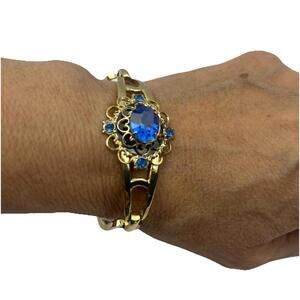 Vintage CORO Signed Sapphire Blue Rhinestone Filigree Gold Tone Bangle Bracelet